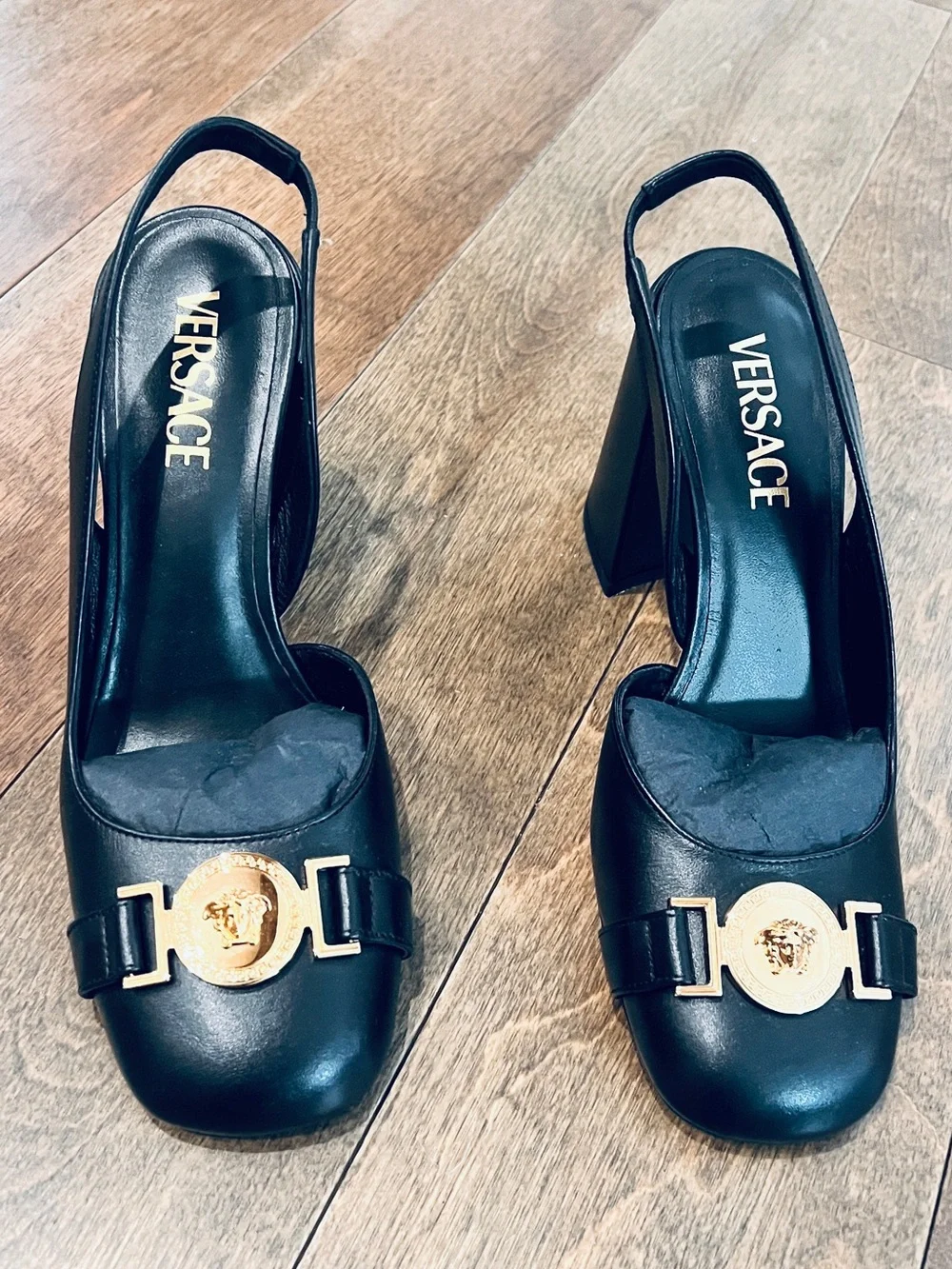 Classic Versace Black Leather Slingback Heels with Gold Medallion Accent